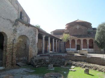 The baptistry, with the Church of Santa Fosca in the background — Torcello island, Venetian Lagoon, Italy.