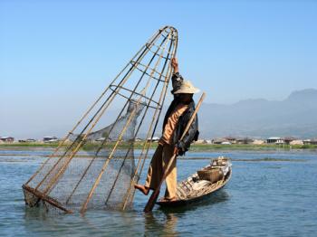 Fisherman on Inle Lake in Myanmar. Photo by Peg Sonnek