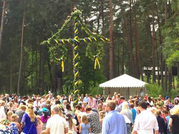 People danced around the maypole, in Karlstad’s Mariebergsskogen, during Midsummer festival. Photo by Karen Stensgaard