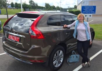 Karen Stensgaard dropping the SUV off at the Volvo factory in Göteborg. Photo by Michael Stensgaard.