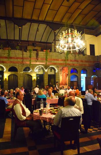 Locals dining in a restaurant in the Ancient City area of Damascus.