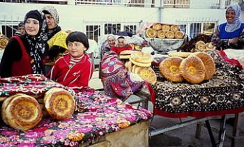 A family of bread merchants in Bishkek, Kyrgyzstan. Photo by Michel Behar/MIR Corporation