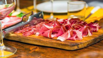 Prosciutto, produced on a small family farm. Photo by Addie Mannan Photography.