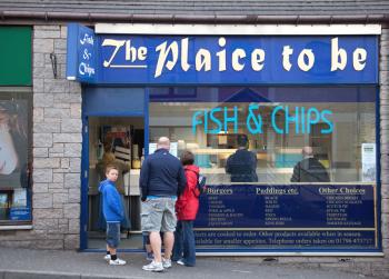 If you need cheap street food in Britain, get take-out from a fish-and-chips shop such as this one in Pitlochry, Scotland. Photo by Dominic Bonuccelli