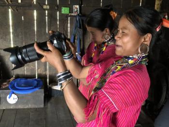 Kayaw tribeswoman having fun with one of our cameras.