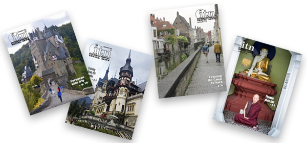 A selection of past International Travel News issue covers
